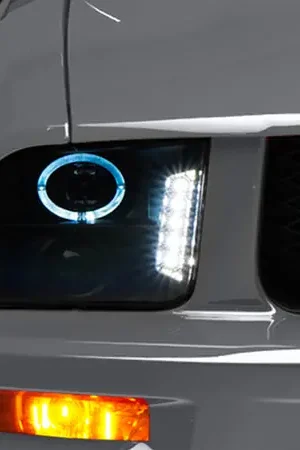 Raxiom 05-09 Ford Mustang w/ Halogen LED Halo Prjctr Headlights-Blk Hsng(Smoked Lens Exclude GT500) Buy Direct