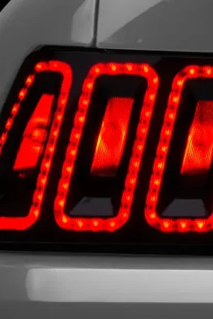 Raxiom 99-04 Ford Mustang Excluding 99-01 Cobra Icon LED Tail Lights- Black Housing (Smoked Lens) Grab Now