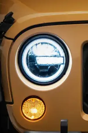 While Supplies Last Raxiom 97-18 Jeep Wrangler TJ/JK 7-Inch LED Headlights w/ Halos- Black Housing (Clear Lens)